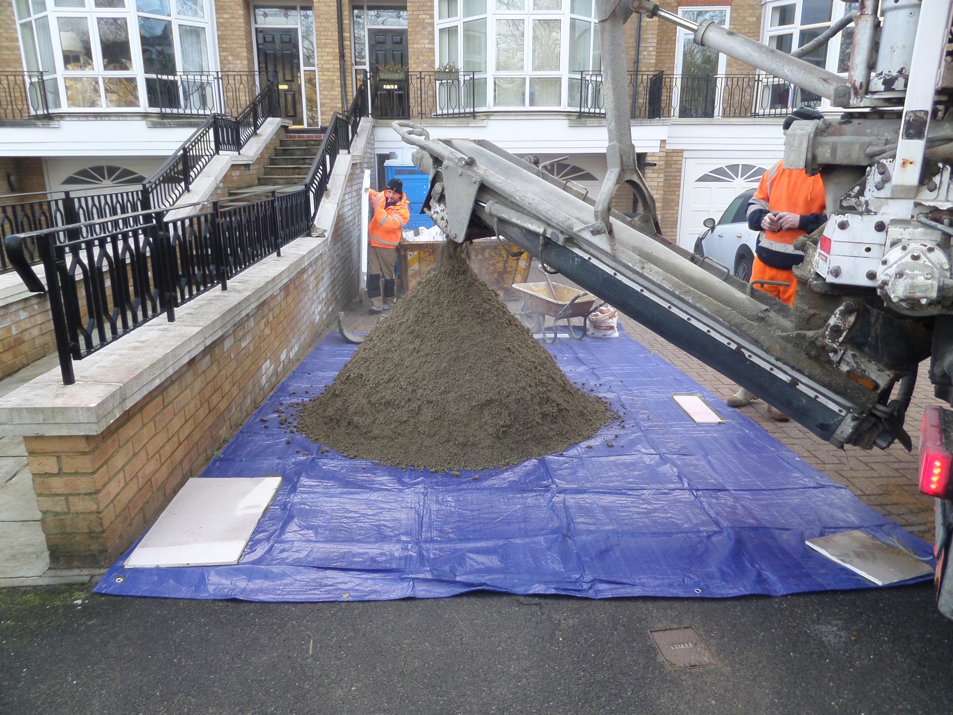 pouring new layer of concrete over concrete